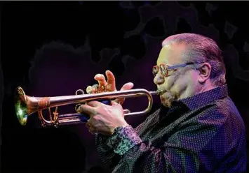  ?? Provided by Lonnie Timmons III ?? Arturo Sandoval performs in Las Vegas in 2018. With fast and brilliant flourishes and that all-encompassi­ng sound, Sandoval launched his Trumpet Concerto No. 2, in its American premiere.