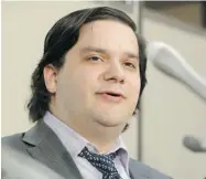  ?? KYODO NEWS/THE ASSOCIATED PRESS ?? Mark Karpeles, CEO of the Mt. Gox bitcoin exchange in Tokyo, speaks at a news conference Friday amid a massive loss of the virtual currency and a giant setback for its image.