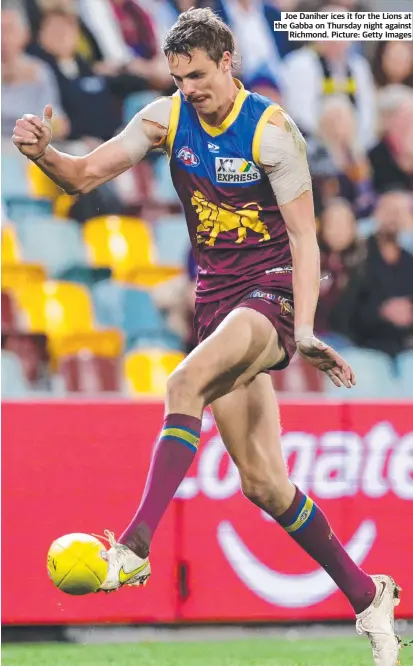  ?? ?? Joe Daniher ices it for the Lions at the Gabba on Thursday night against Richmond. Picture: Getty Images