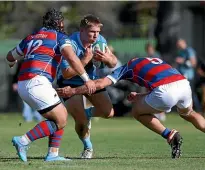  ?? PETER MEECHAM/ GETTY IMAGES ?? Crusaders midfield back Jack Goodhue on the charge for club team Shirley two weeks ago.