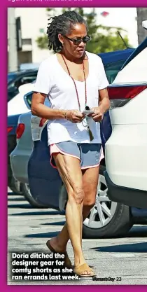  ??  ?? Doria ditched the designer gear for comfy shorts as she ran errands last week.