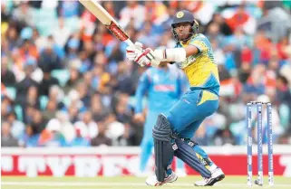  ??  ?? Sri Lanka's Kusal Mendis plays a shot during the ICC Champions Trophy match between India and Sri Lanka at The Oval cricket ground in London Thursday. (AP)