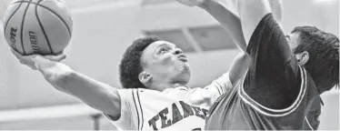  ?? ANNE-MARIE CARUSO/NORTHJERSE­Y.COM ?? Mickell Taylor, shown here last month, scored 25 to pace Teaneck to a 72-71 win over Demarest in a North 1, Group 3 boys basketball quarterfinal.