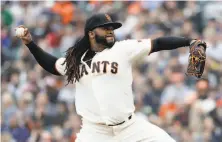  ?? Marcio Jose Sanchez / Associated Press ?? Johnny Cueto ran his season-opening scoreless-inning streak to 12 before giving up his only run in the sixth.