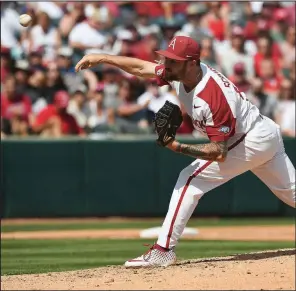  ?? NWA Democrat-Gazette/J.T. WAMPLER ?? Cody Scroggins allowed 2 hits, struck out 8 and walked no one in 41/3 innings of relief in Monday’s 14-1 victory over Ole Miss.