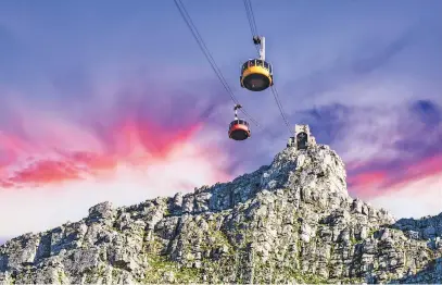  ?? Picture: Supplied ?? BIRD’S-EYE VIEW. Table Mountain cable cars under a bright sky. Cape Town Tourism says internatio­nal arrivals have reached a level of 74% of what they were in the last ‘normal month’, April 2019.
