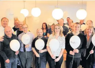  ??  ?? Staff at Clingfoil celebrate 35 years in business