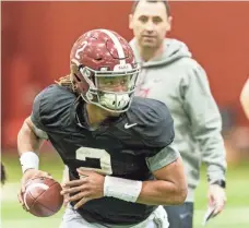  ?? VASHA HUNT, AP ?? Alabama quarterbac­k Jalen Hurts works out Thursday in Tuscaloosa, Ala., in preparatio­n for Monday’s national title game.