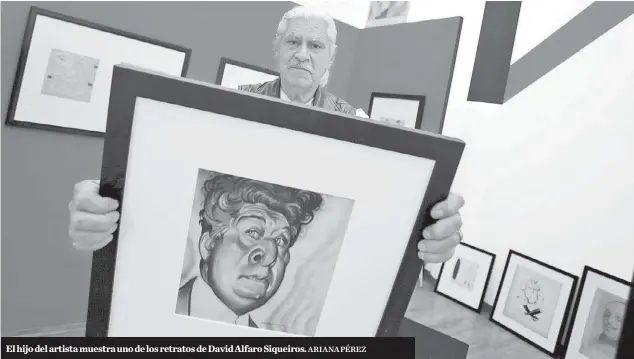  ?? ARIANA PÉREZ ?? El hijo del artista muestra uno de los retratos de David Alfaro Siqueiros.