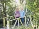  ??  ?? Bridging the gap . . . Margaret and Barry Sloper on the wooden bridge Barry built.