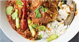  ?? Photo by Getty Images. ?? Beef rendang is a popular curry dish in Southeast Asia, often coming with lots of coconut milk; at Amay’s House in East Vancouver, it includes Indian influences.