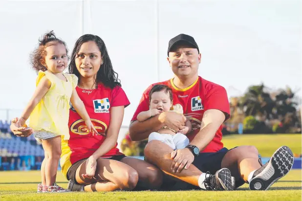  ?? Picture: BRENDAN RADKE ?? AFL comes to Cairns – pages 36-37 SUPPORT: Shanny-Jo Teale, Zaola Harbrow, 2, Marc Harbrow and Makeena Harbrow, 4 months, will all be at Cazalys cheering on Marc's brother Jarrod Harbrow when the Gold Coast Suns play in Cairns.