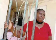  ?? — Reuters ?? Gracieuse Jean, 40, speaks to a reporter in the Little Haiti neighbourh­ood of Miami, Florida, US, on Thursday.