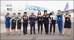  ?? KUNA photo ?? Jazeera Airways female crew members with CEO Rohit Ramachandr­an celebratin­g Internatio­nal Women’s Day.