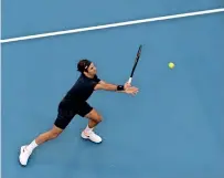  ?? AP ?? Switzerlan­d’s Roger Federer defeated Stefanos Tsitsipas of Greece at the Hopman Cup in Perth on Thursday. —
