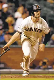  ?? NHAT V. MEYER/STAFF ?? Conor Gillaspie watches his two-run home run leave the park in the Giants’ Sept. 27 game against the Rockies.