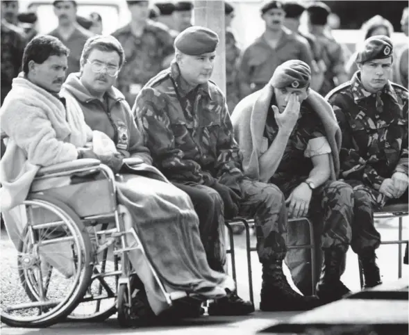  ?? NZ Herald ?? Survivors Geoff Snowdon, Brent Jaggard, Grant Mumby, Brendon Burchell and Rayner Berger at a service in 1990.