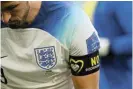  ?? ?? Fifaapprov­ed: England’s Harry Kane wears the No Discrimina­tion captain's armband. /Matthias Hangst/Getty Images