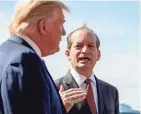  ?? ANDREW HARNIK / AP ?? Labor Secretary Alex Acosta announces his resignatio­n Friday with President Donald Trump at his side.