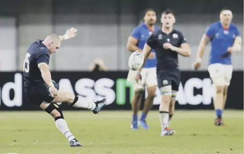  ??  ?? 0 From 40 metres out, Stuart Hogg sends a stunning drop goal over the posts to give Scotland a 20-0 half-time lead in Kobe.