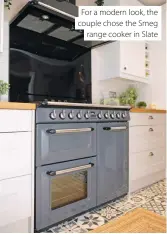  ?? ?? For a modern look, the couple chose the Smeg range cooker in Slate