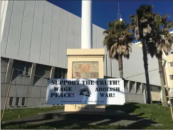  ?? HEATHER SHELTON — THE TIMES-STANDARD ?? The Veterans For Peace Humboldt Bay, Chapter 56, sign hangs on its own outside the Humboldt County Courthouse. The sign is usually part of a weekly peace vigil, now on hold.