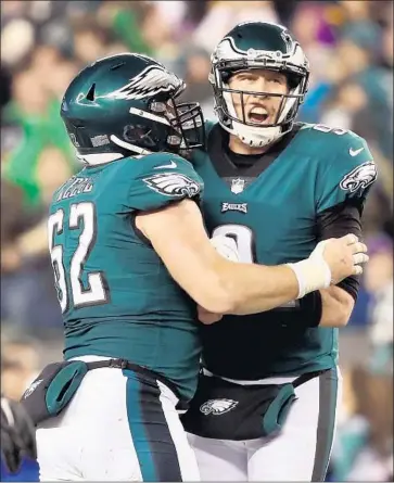  ?? Abbie Parr Getty Images ?? NICK FOLES (9) took over a league-leading Philadelph­ia Eagles team after Carson Wentz went down with a season-ending injury, and the former starter turned in a couple of strong playoff performanc­es.