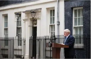  ?? (Henry Nicholls/Reuters) ?? BRITISH PRIME Minister Boris Johnson addresses the media yesterday outside 10 Downing Street in London.