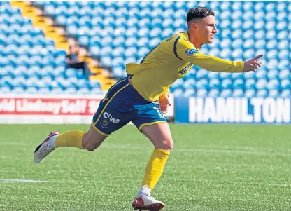  ?? Picture: SNS. ?? Michael O’halloran celebrates after scoring St Johnstone’s winner against Kilmarnock at Rugby Park.