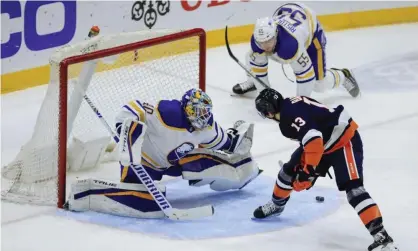  ?? Photograph: Kevin Hagen/AP ?? New York Islanders’ Mathew Barzal scores from between his legs.