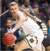  ?? AP ?? Notre Dame’s Dane Goodwin saves the ball from going out of bounds during the first half Tuesday against Wake Forest in South Bend, Ind.