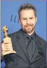  ?? AP PHOTO ?? LEFT:
In this Jan. 7 file photo, Sam Rockwell poses in the press room with the award for best performanc­e by an actor in a supporting role in any motion picture for “Three Billboards Outside Ebbing, Missouri” at the 75th annual Golden Globe Awards at...