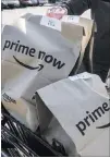  ??  ?? The Associated Press file Amazon’s Prime Day deals are coming to the aisles of Whole Foods this year.