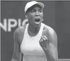  ?? ASSOCIATED PRESS ?? Venus Williams celebrates after winning a point against Kirsten Flipkens during her 7-5, 6-2 victory in the first round of the Australian Open.