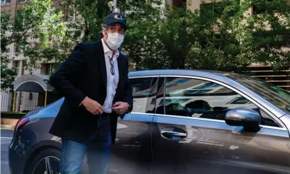  ??  ?? Michael Cohen arrives at his Park Avenue home after being released from federal prison on furlough due to medical concerns related to Covid-19 on 21 May 2020 in New York City. Photograph: David Dee Delgado/Getty Images
