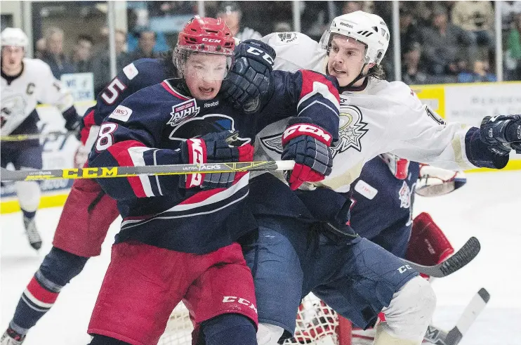  ?? — POSTMEDIA NETWORK FILES ?? Cale Makar of the Brooks Bandits, left, the top defenceman in the Canadian Junior Hockey League, could give the Canucks a power play quarterbac­k.