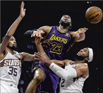  ?? Robert Gauthier Los Angeles Times ?? LeBRON JAMES had a rough game against the Suns, scoring a season-low 10 points and sitting out the fourth quarter of a blowout defeat. James says the Lakers must have a good start at Utah on Saturday.