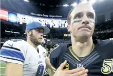  ?? BUTCH DILL/THE ASSOCIATED PRESS ?? In this Dec. 4, 2016, file photo, Detroit Lions quarterbac­k Matthew Stafford, left, greets New Orleans Saints quarterbac­k Drew Brees after the Lions defeated the Saints 28-13 in an NFL football game in New Orleans. When Brees learned of Stafford’s...