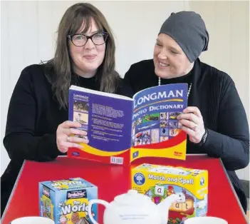  ??  ?? Tea and chat Summerlee manager Lu McNair and language lecturer Khadija Hadji get set for this Saturday’s first language cafe event at Summerlee