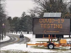  ?? Will Waldron / Times Union ?? A sign on the University at Albany campus points drivers toward a COVID-19 testing site on Wednesday in Albany. Ualbany is to host a mass-vaccinatio­n clinic on Friday.
