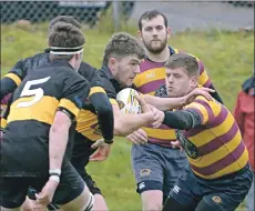  ?? Photograph: Iain Ferguson, alba.photos ?? Callum Boyd fights his way through the Loch Lomond defence in Saturday’s clash at Banavie.