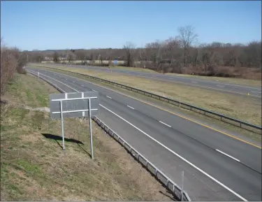  ?? DWAYNE KROOHS — DAILY FREEMAN ?? This stretch of the New York State Thruway was empty of cars at times mid-Sunday afternoon, March 22, 2020, amid closures and restrictio­ns stemming from the coronaviru­s outbreak. The thruway’s southbound lanes would usually be crowded with travelers returning to the New York City area at the end of the weekend. The photo was taken from a bridge on Sawkill Road near Denver and Woods roads in the town of Ulster, N.Y.