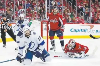 ?? Bruce Bennett, Getty Images ?? Tampa Bay’s Alex Killorn celebrates after scoring the eventual game-winning goal on Washington goaltender Braden Holtby at 11:57 of the third period in Game 4 of the Eastern Conference Final in Washington on Thursday night.