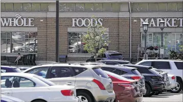  ?? ASSOCIATED PRESS
NAMY.HUH/ ?? Whole Foods gives Amazon a playground to try out lots of ideas on how stores should be laid out, how to optimize for online delivery, making checkout lines invisible or some other innovation­s no one has thought of yet.