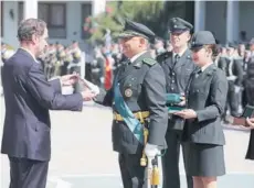  ??  ?? El ministro de Justicia participó ayer en la ceremonia de investidur­a del nuevo director nacional.