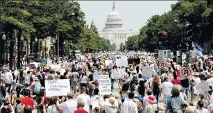  ?? PHOTO: REUTERS ?? Immigratio­n activists march towards the US Capitol, in Washington, yesterday to protest the Trump Administra­tion’s immigratio­n policy.