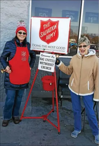  ?? SUBMITTED PHOTO ?? Bronwyn Martin of Kennett Square, left, and Mary Kowalewski volunteer for the Salvation Army’s Red Kettle Program that runs up until Christmas. The program helps millions of people nationally.