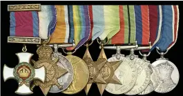  ??  ?? Honour... Alfred’s medals. HMS Norfolk, below left, and the Bismarck