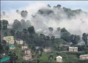  ?? AP ?? Monsoon clouds above a township in Dharmsala on Monday. Rains have been deficient despite an early start, the met office has said.