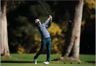  ?? RYAN KANG ?? Jordan Spieth hits his second shot on the 13th hole as second round play continues during the Genesis Open golf tournament at Riviera Country Club on Saturday, Feb. 16, in the Pacific Palisades area of Los Angeles.